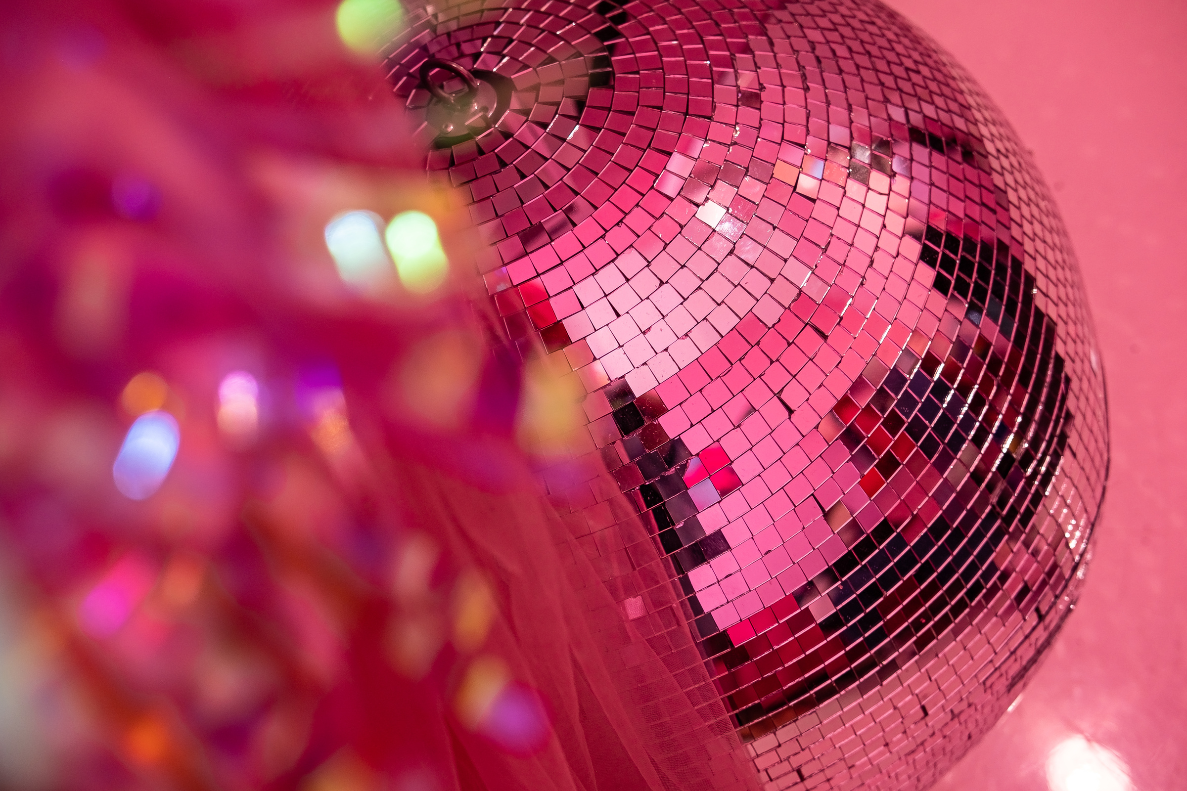 A Pink Disco Ball on Pink Background